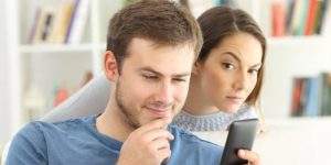 Wife secretly spy on partner's phone to check messages and calls.